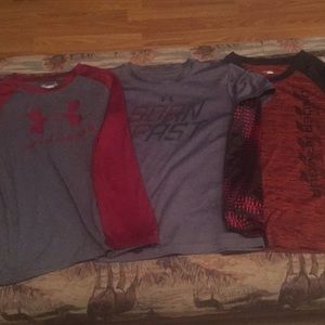 3 boy 7 long sleeve under armour shirts.